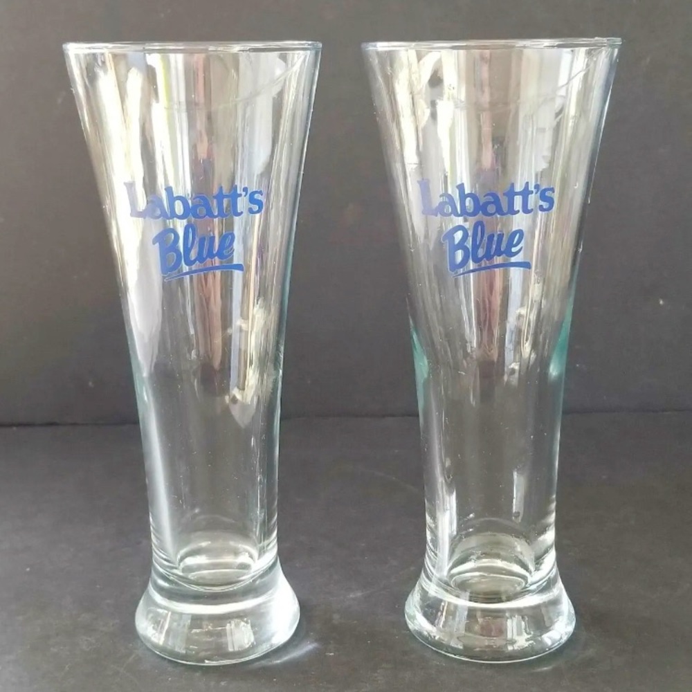 2 LABATT'S BLUE TAPERED BEER GLASSES WITH BLUE WRITING 8” TALL.